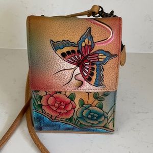 Annuschka mini sling organizer bag.(pre owned)